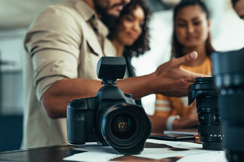 Close up of a digital camera on a table