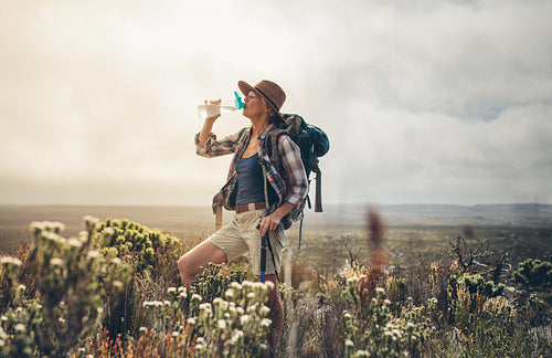Woman taking a break during her trek