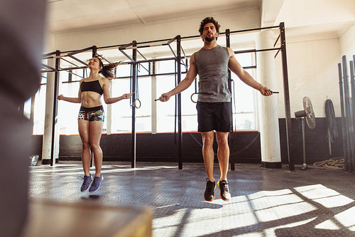 Athletes training hard at the gym