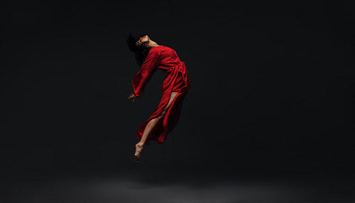 Contemporary dancer dancing on studio background