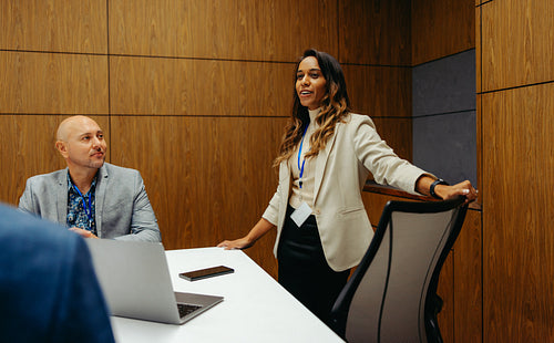 Indian businesswoman leading a meeting in modern office
