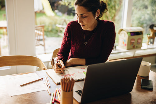Woman artist working from home