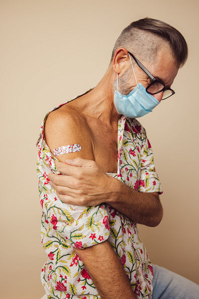 Mid adult man after getting vaccination