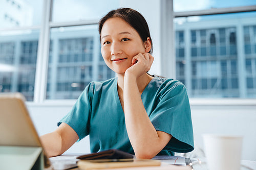 Young Asian woman studying to be a nurse