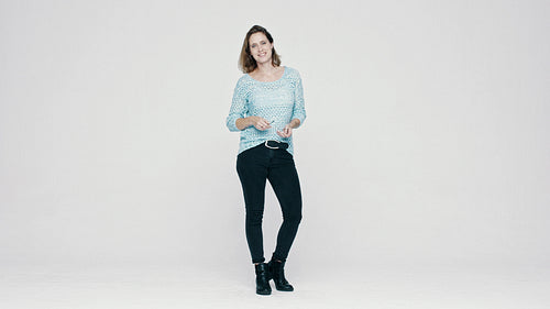 Fashionable woman wearing glasses and smiling