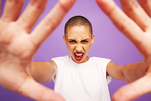 Portrait of a excited female with hands in front