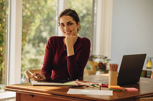 Female illustrator working from home