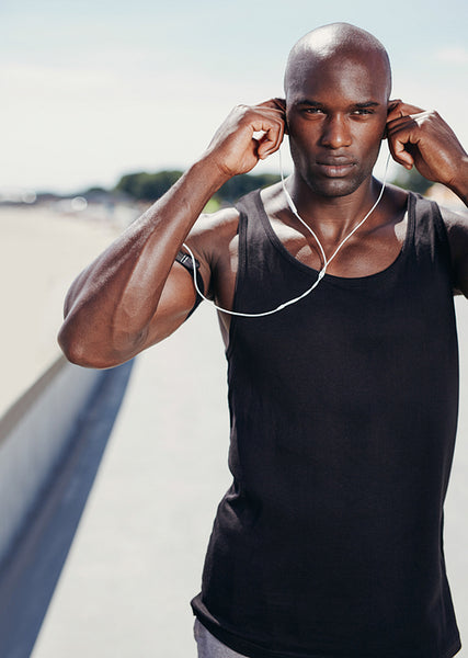 Young african man listening to music