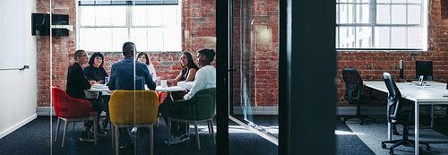 Team of businesspeople having a discussion during a meeting