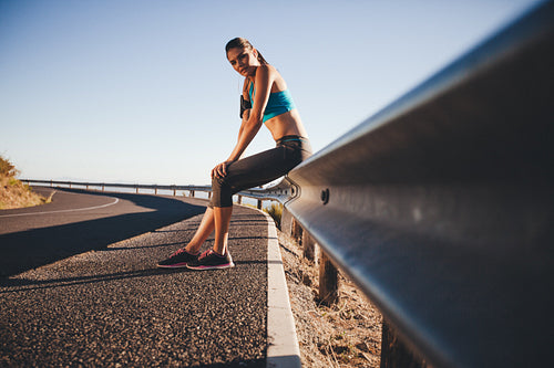 Woman relaxing after a outdoor training