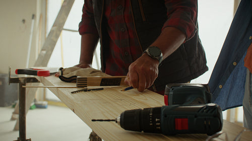 Precision at work: Middle-aged couple planning home renovations