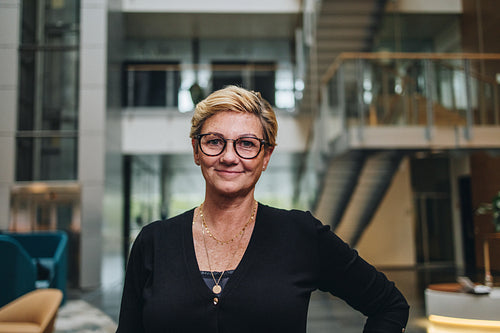 Successful female entrepreneur standing confidently