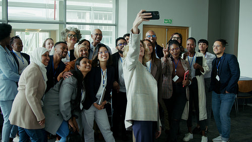 Happy business people taking a selfie