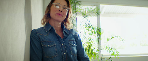 Businesswoman smiles in her modern office