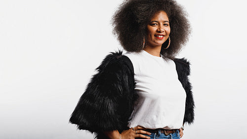 Smiling woman in afro hairstyle