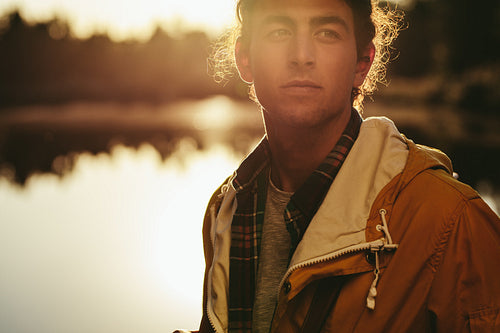 Portrait of a man standing outdoors