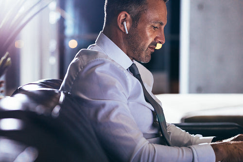 Businesman with earphones