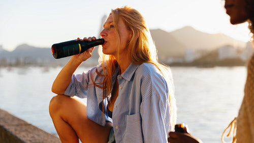 Relaxing at sunset in Mureta Da Urca, Brazil with friends