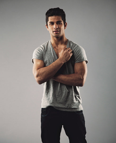 Handsome young man posing confidently