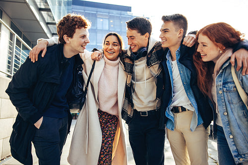 Young students walking together in high school