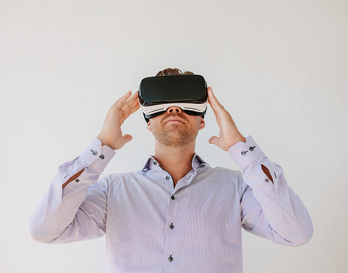 Man wearing a pair of VR glasses