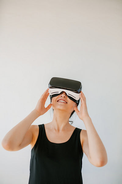 Young woman using the virtual reality headset