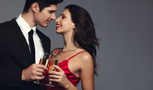 Beautiful couple celebrating with champagne