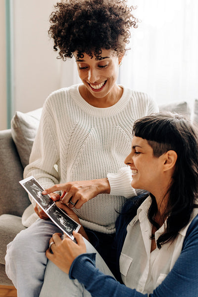 Parents-to-be looking at their ultrasound scan