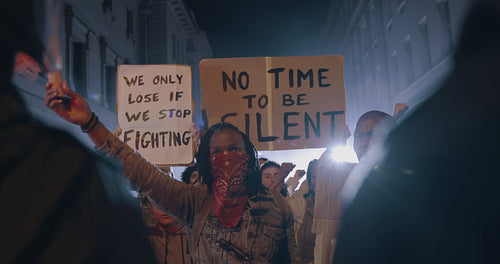 Group of people protesting with smoke grenades