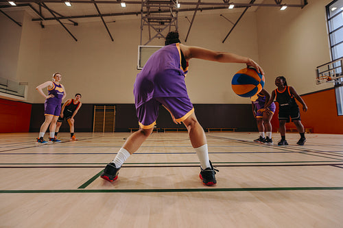 Teamwork in action: Female athletes handling the ball with precision
