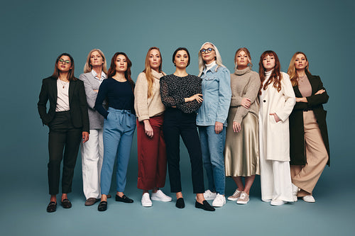 Independent businesswomen of different ages standing together