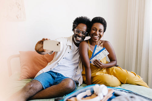 Married couple capturing precious memories on romantic getaway