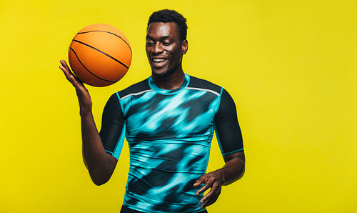 Happy young basketball player