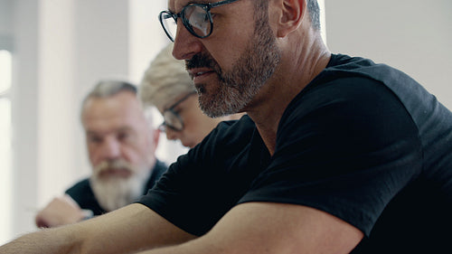 Business colleagues planning work in a meeting