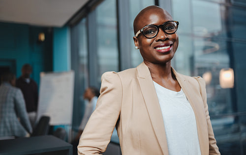 Portrait of a business woman smiling in a business setting