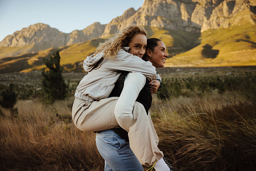 Friends hiking through scenic mountains