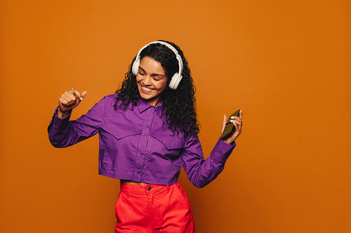 Movin' and groovin' with vibrant colors on a orange background