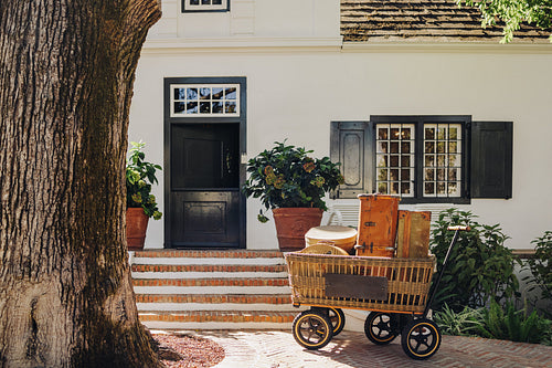 Travelling bags placed in a trolley cart at a hotel