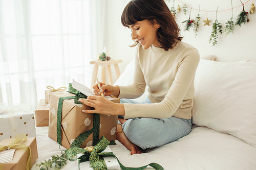 Woman writing a letter for christmas