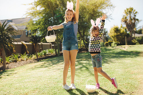 Girls playing in their backyard