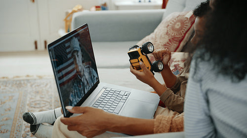 Long distance family time: Deployed dad video calls his family from the military