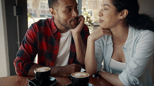 Couple enjoying at a coffee shop
