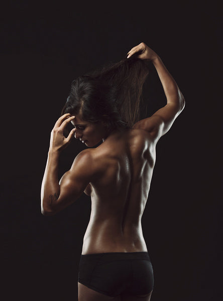 Young fitness woman with perfect body