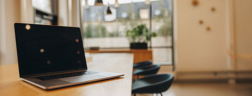 Laptop on board room table