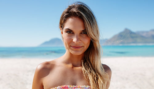 Sensual young woman on the beach