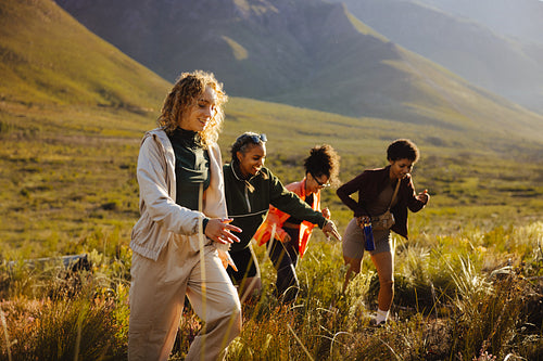 Group of friends hiking in nature