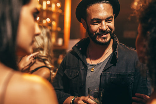 Young people at pub having good time