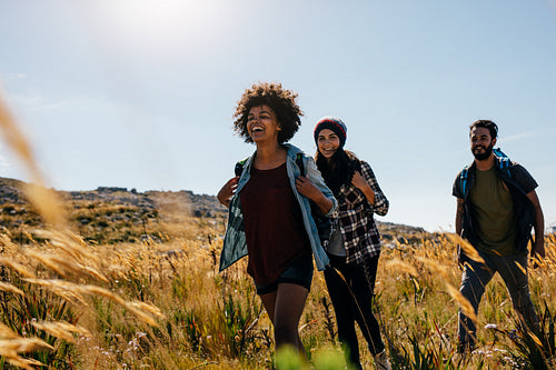 Group of friends on walk through countryside
