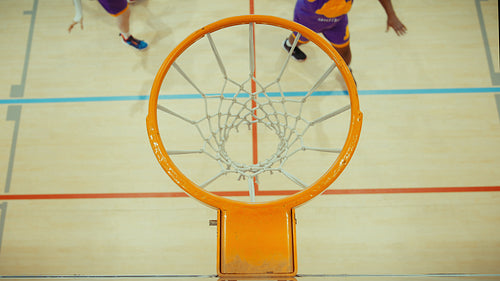 Perfect shot through basketball hoop