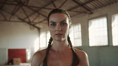 Sportswoman standing in the gym